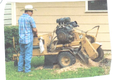 Vintage photo of stump grinding equipment, reflecting the roots of Amaya Tree Service's tree care experience